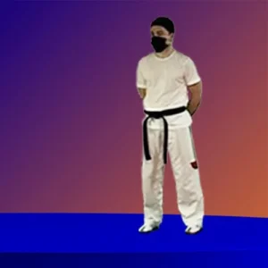 M. Santos (Nutricionista Deportivo) con dobok de taekwondo en dojang